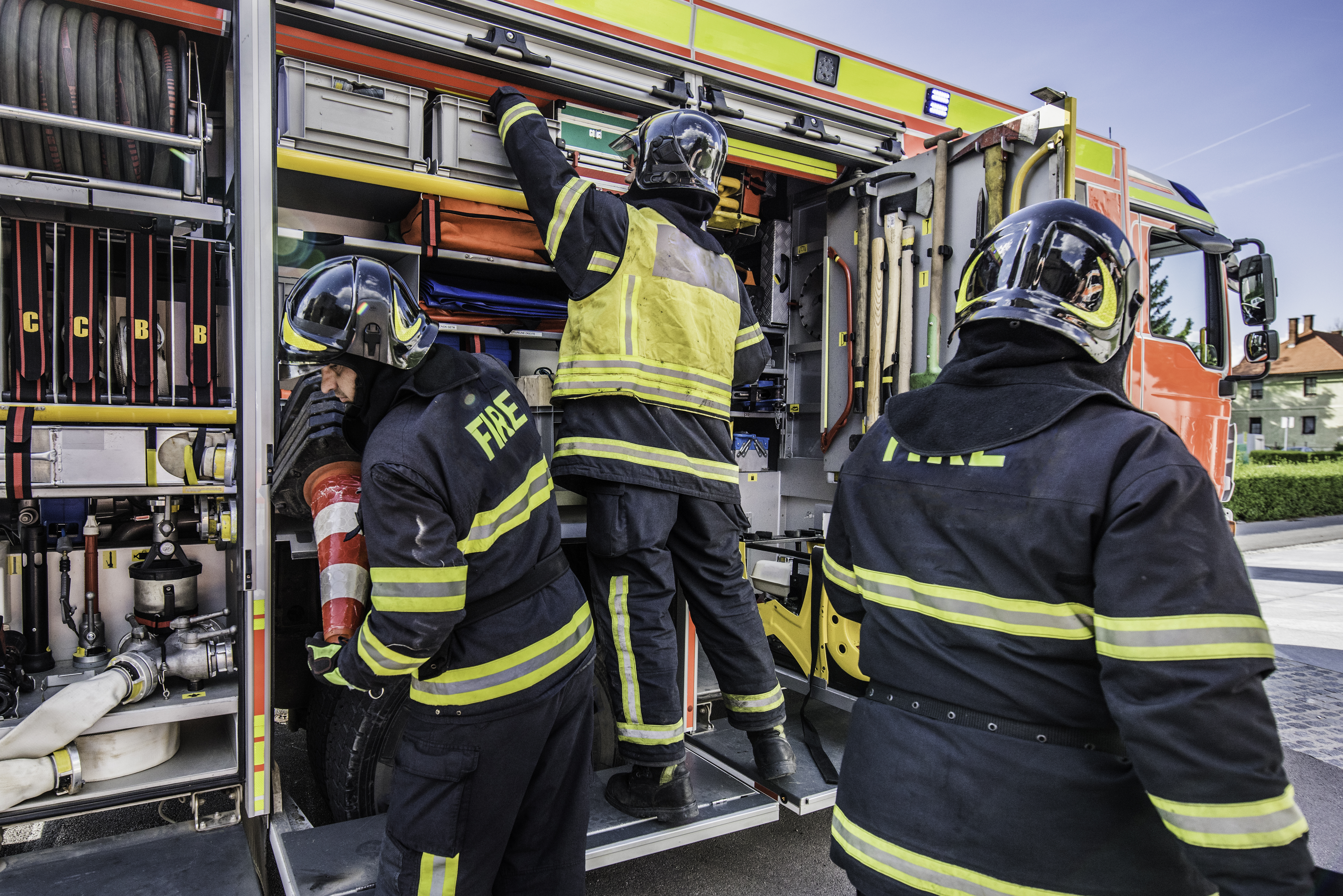 Fire engine and firefighters