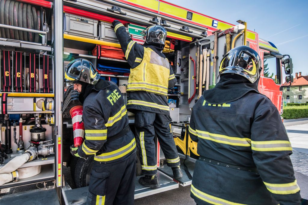 Fire engine and firefighters