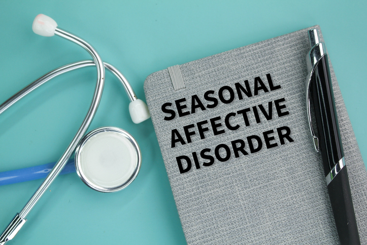 stethoscope with the word seasonal affective disorder. Light therapy and vitamin D are treatments for winter-pattern SAD